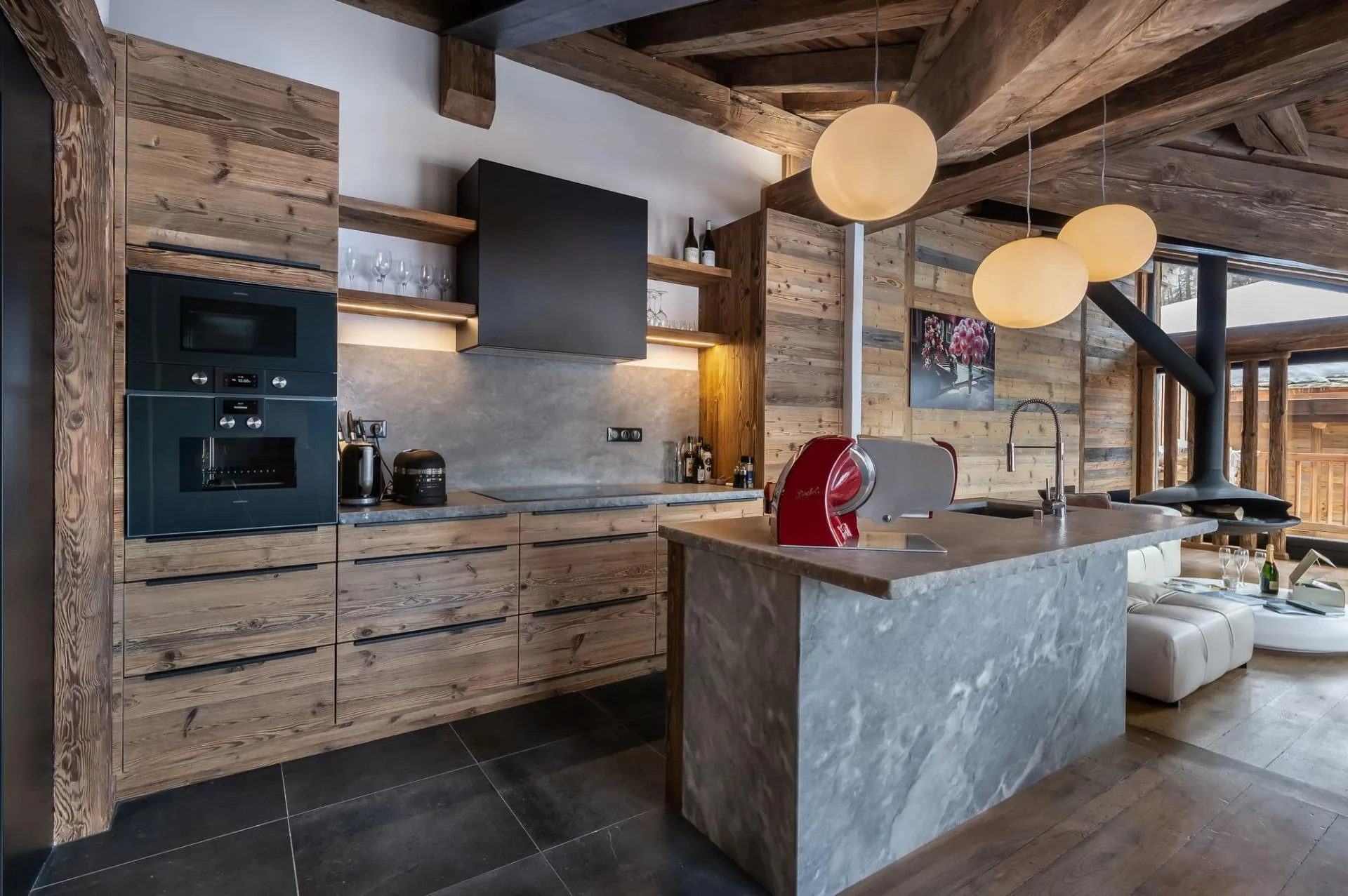 Fitted kitchen with stone island and timber cabinetry