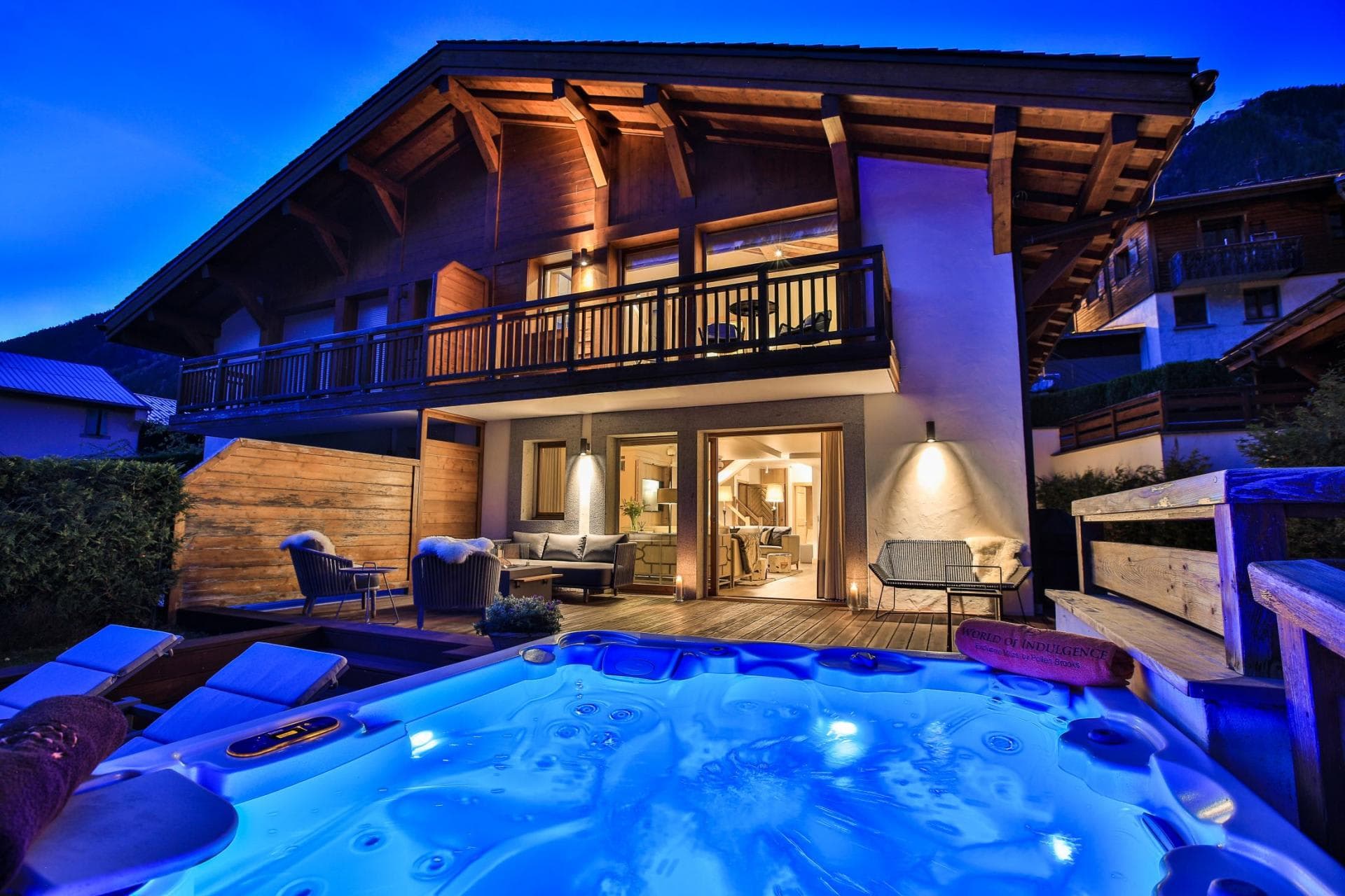 Chalet exterior with ground-floor terrace and private heated hot tub