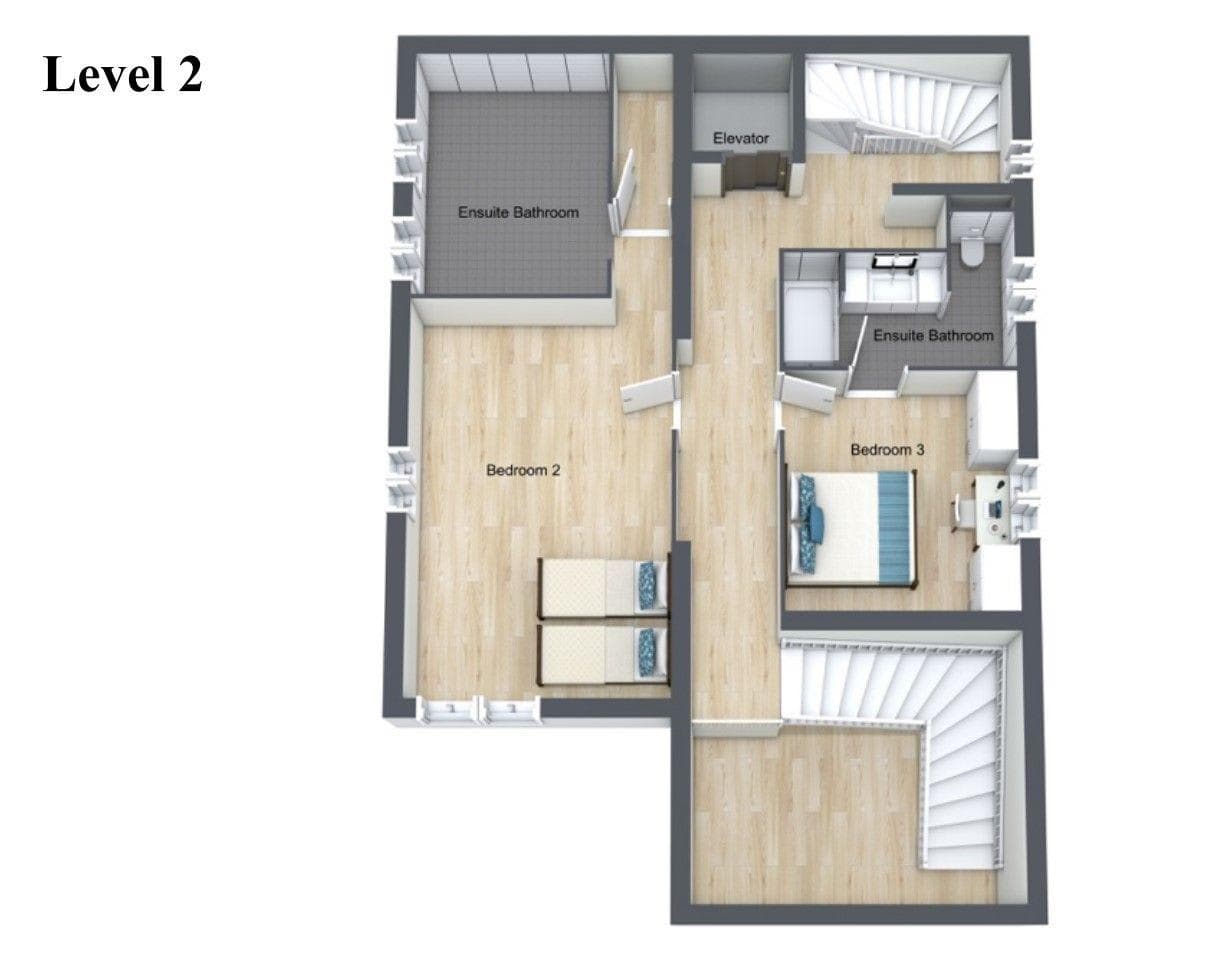 Level 2 layout: two ensuite bedrooms, elevator access, and dual staircases