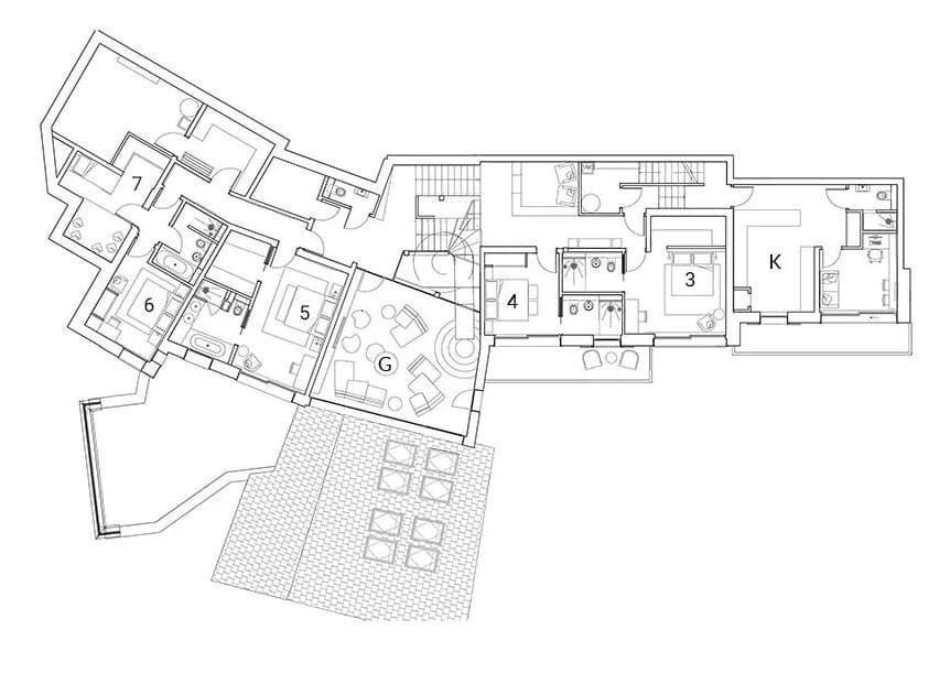 Floor plan: four bedrooms with en suites, kitchen, and living area with terrace