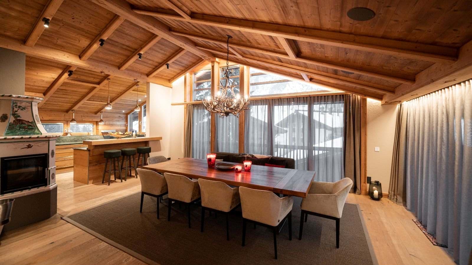 Dining area seats 8; wood-burning stove and breakfast bar seating