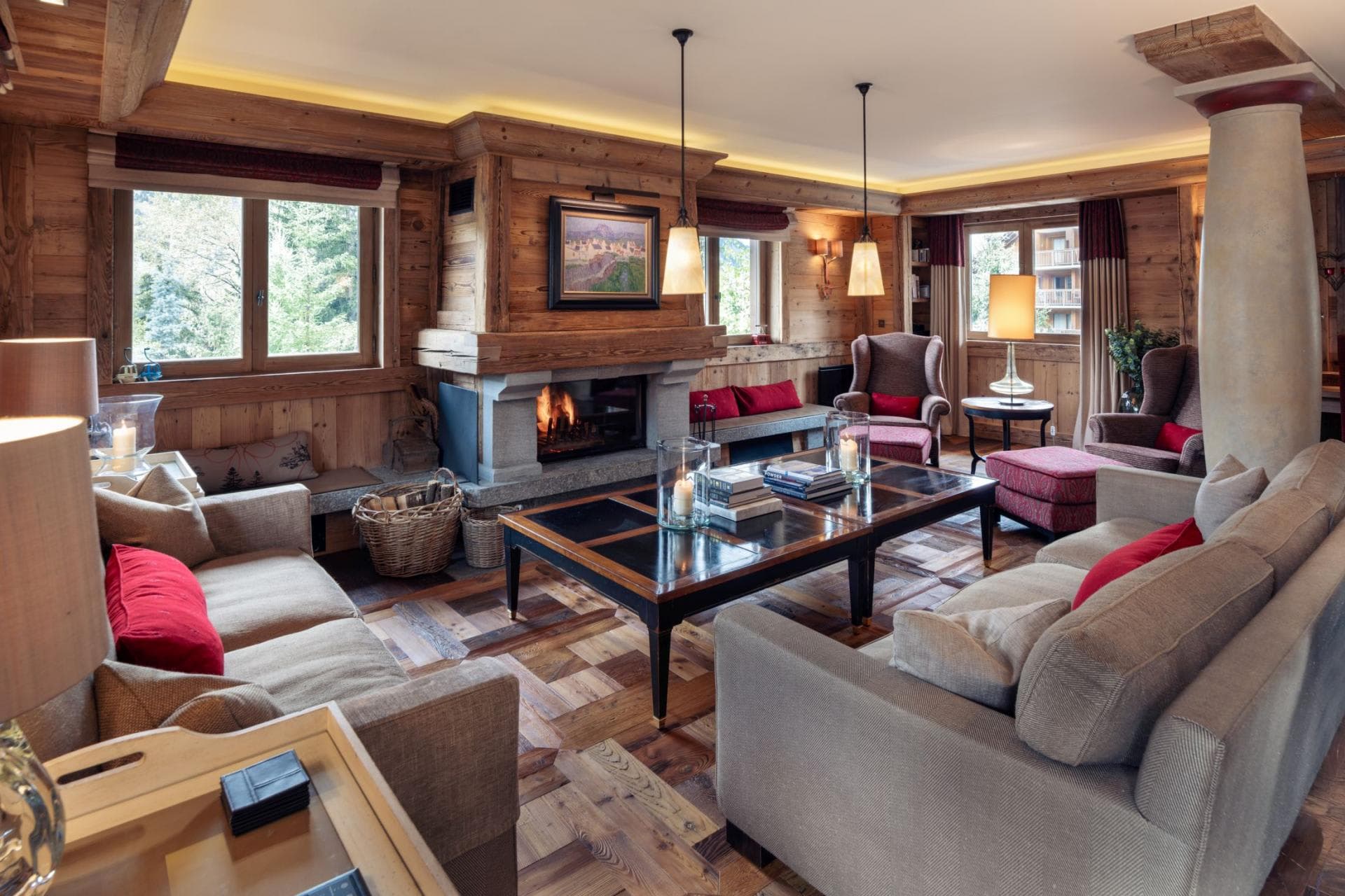 Living area with wood-burning fireplace and seating for 8 guests