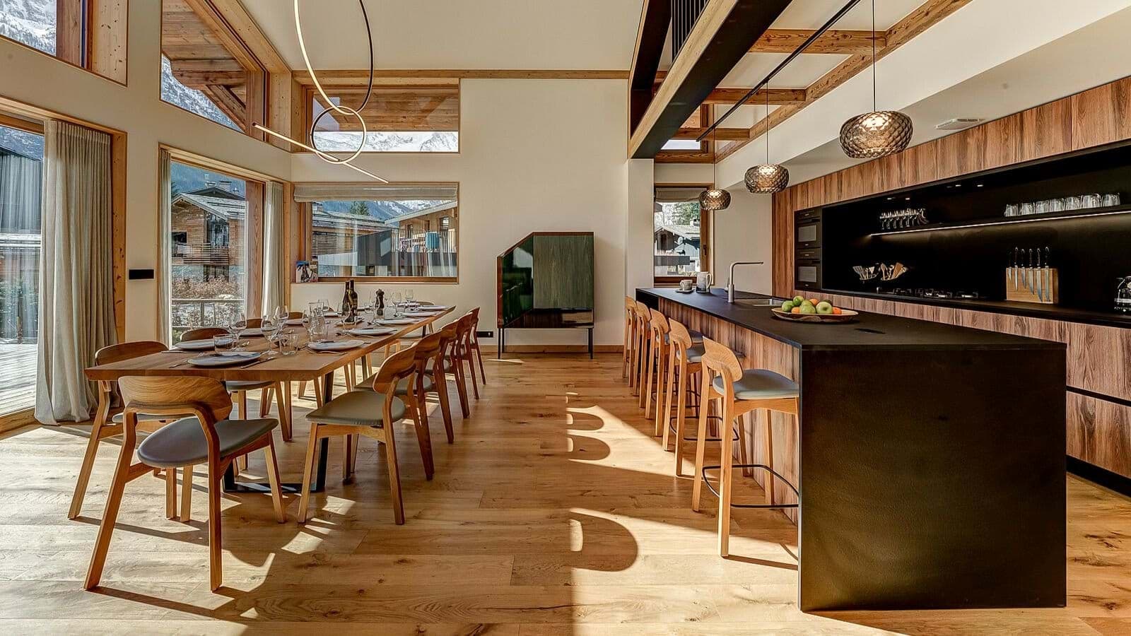 Open-plan dining and kitchen area; dining table seats 10