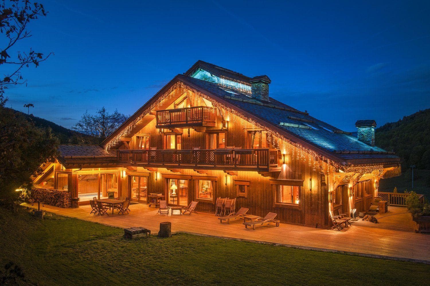 Chalet exterior with multi-level decks and indoor pool access