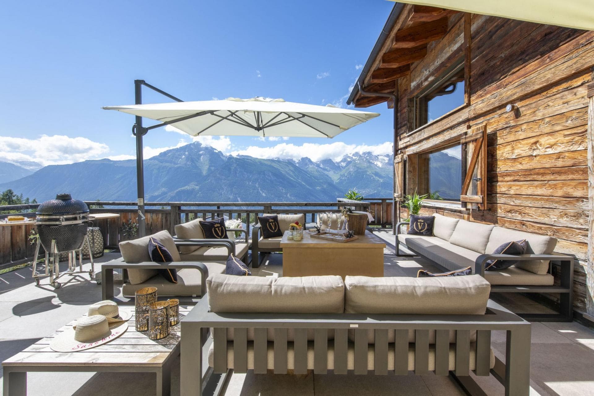 Terrace with seating for 10, Big Green Egg grill, and mountain views