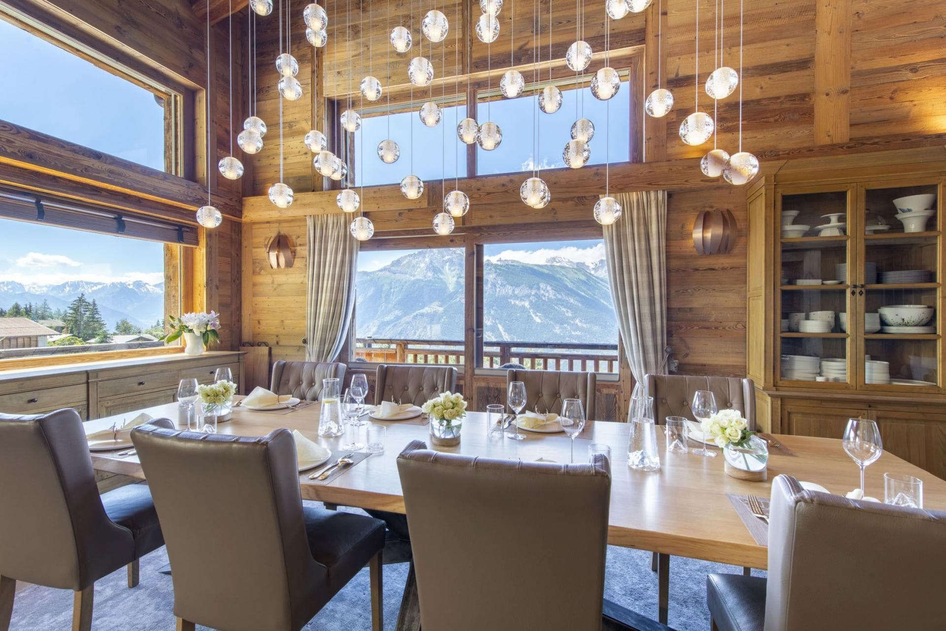 Dining table seats 10 with panoramic mountain views