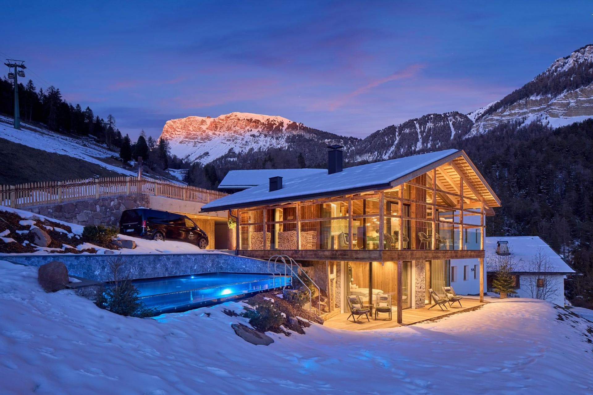 Chalet with heated infinity pool and floor-to-ceiling mountain views