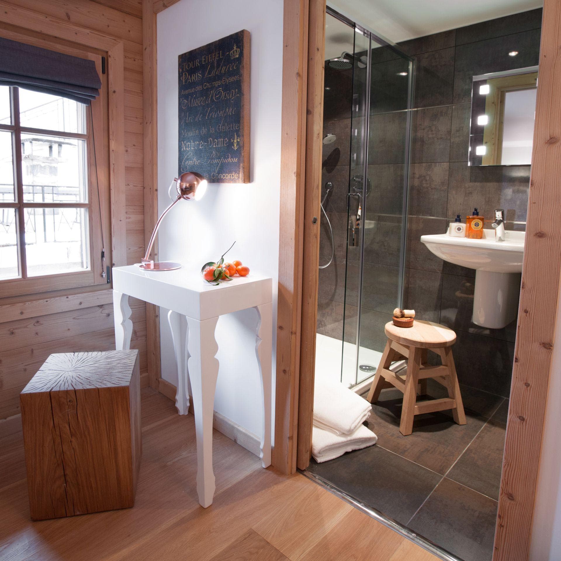 Ensuite bathroom with walk-in rainfall shower and vanity table