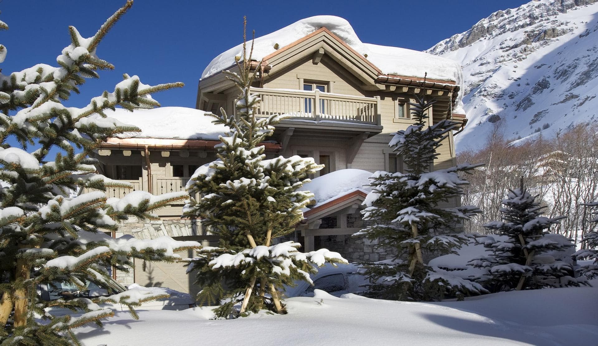 Ski-in chalet with private balconies and heated underground garage access