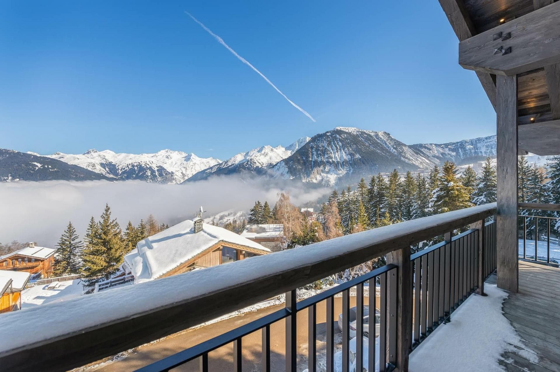 Private balcony with panoramic Alpine mountain and valley views