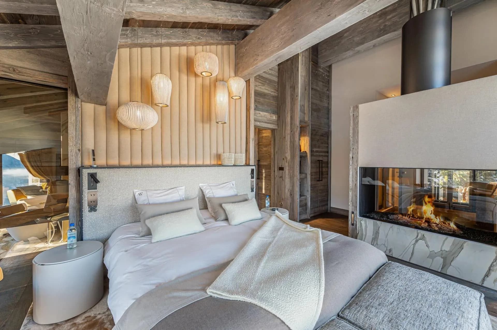 Double bedroom beside a fireplace