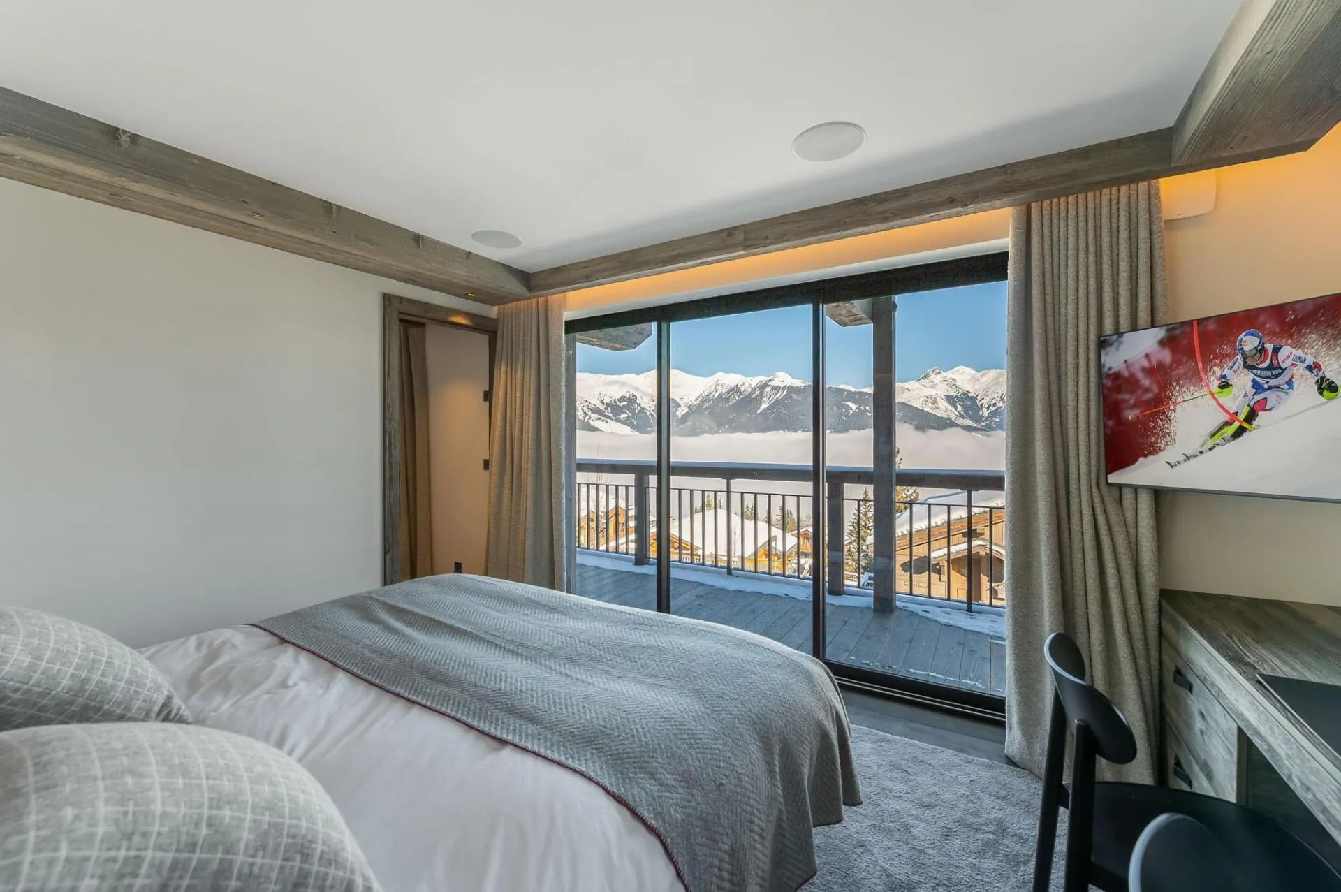 Double bedroom with mountain-facing balcony