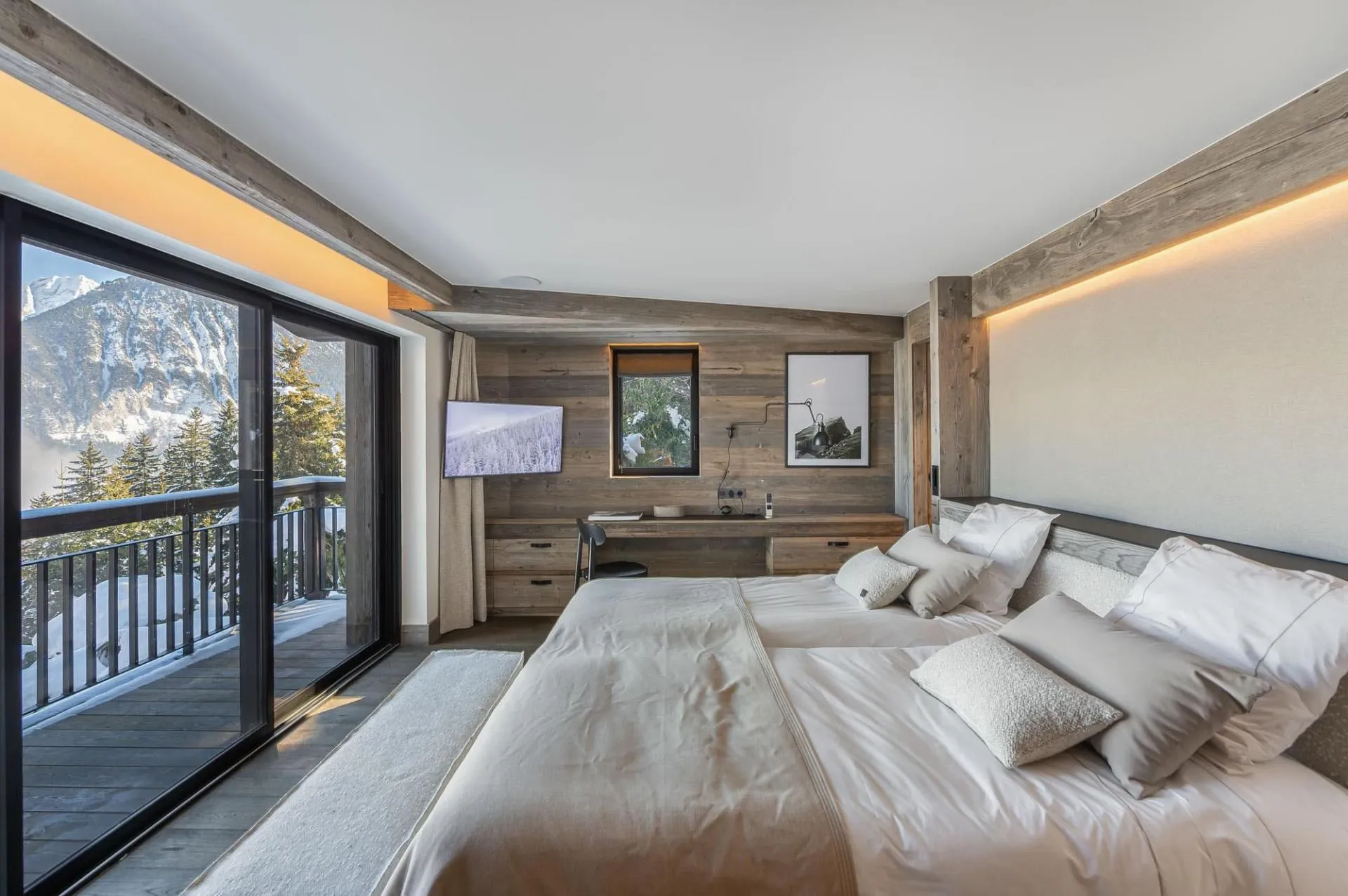Double bedroom with mountain-facing windows
