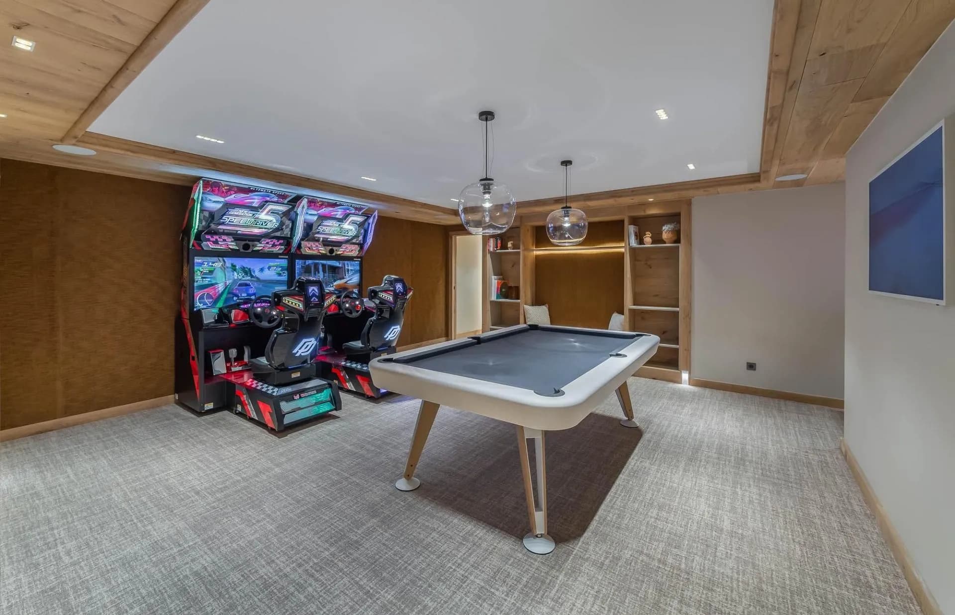 Games room with snooker table and arcade machines