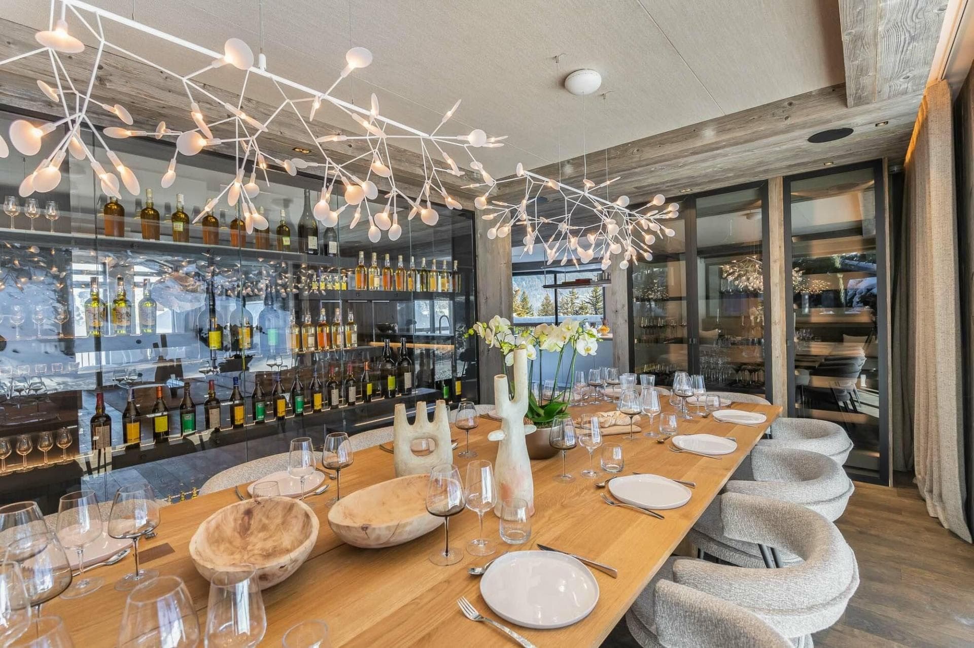 Dining table seats 10; adjacent temperature-controlled wine display