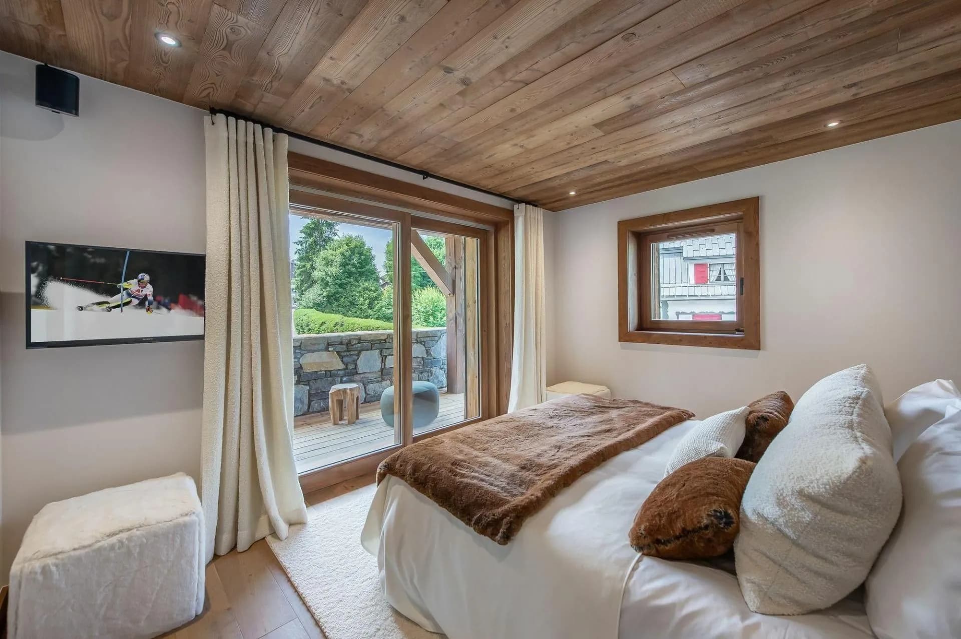 Double bedroom with glazed doors