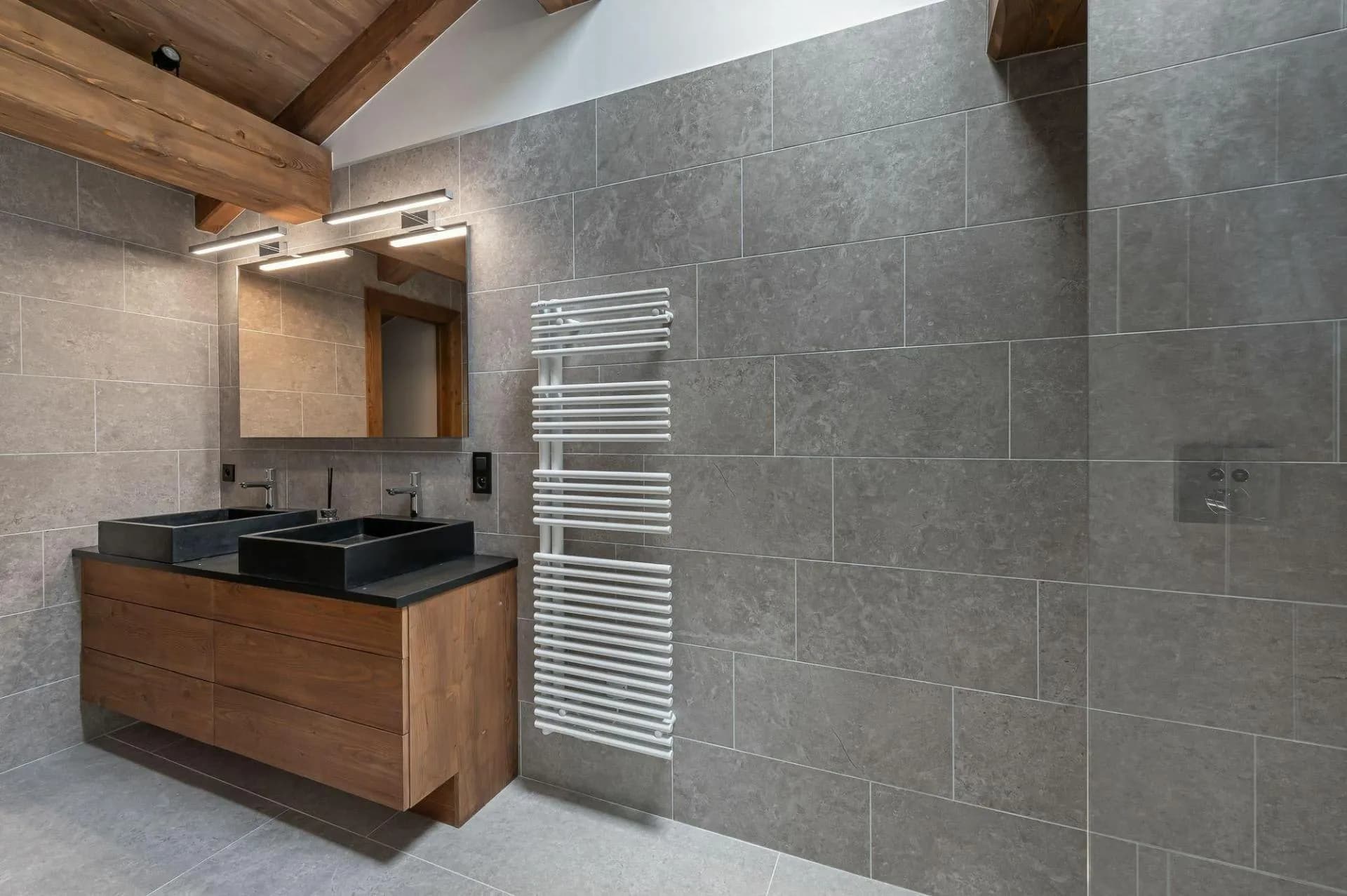 Shower room with vanity and heated towel rail