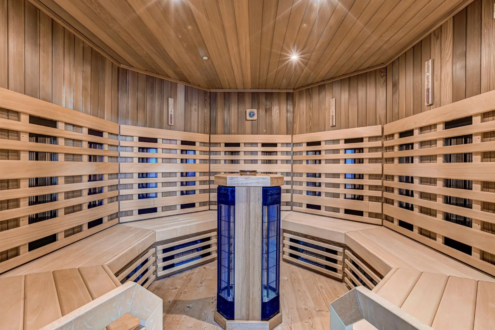 Large sauna with wraparound bench seating