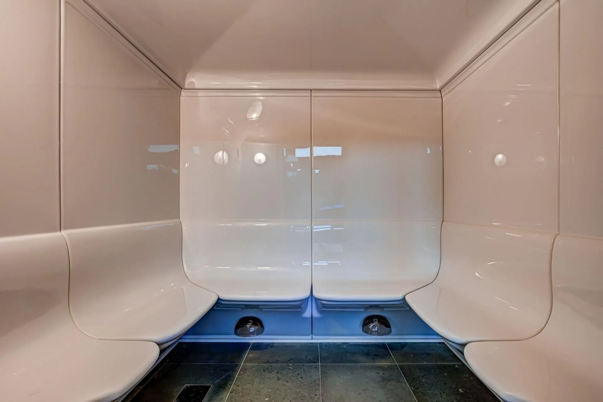Steam room with tiled seating