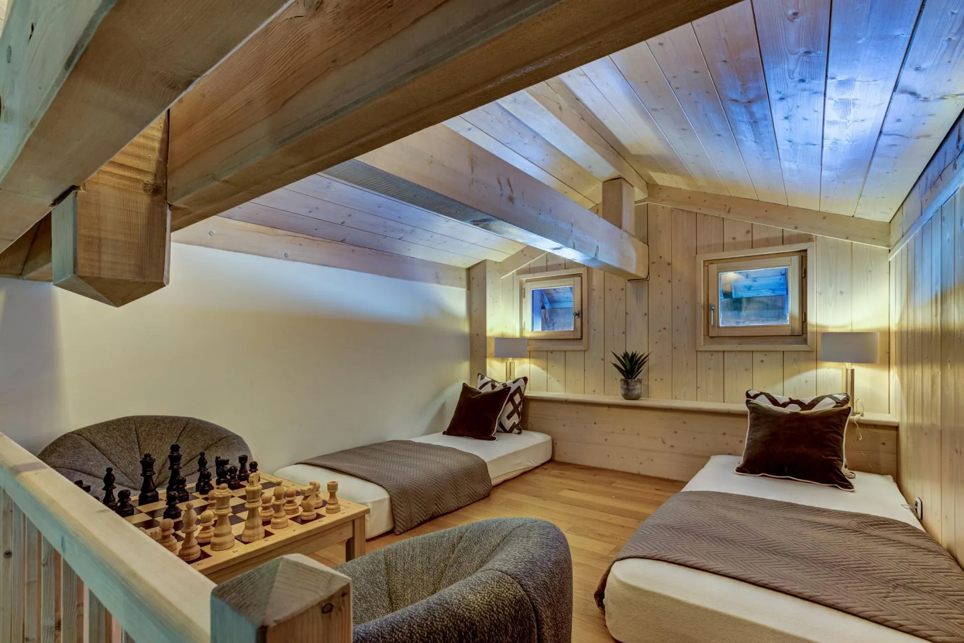Private mezzanine with two single beds accessed from Room 4