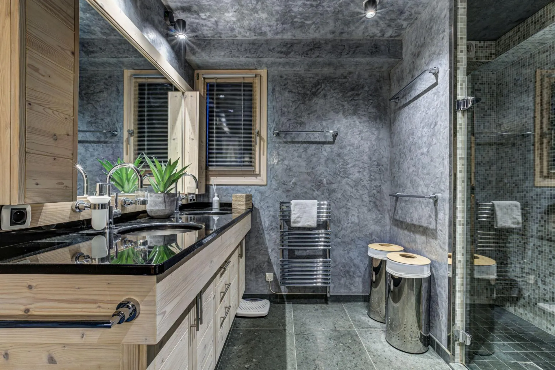 Bathroom with dual vanity and heated towel rack