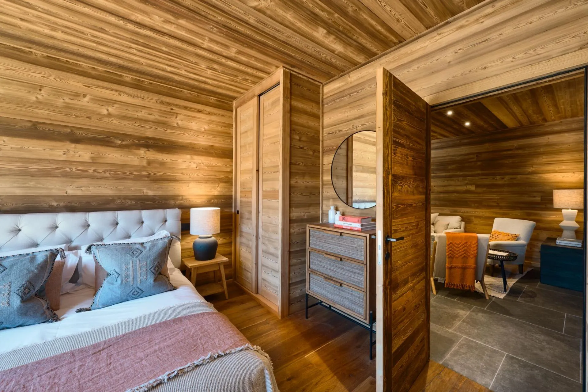 Wood-panelled bedroom entrance and sitting space