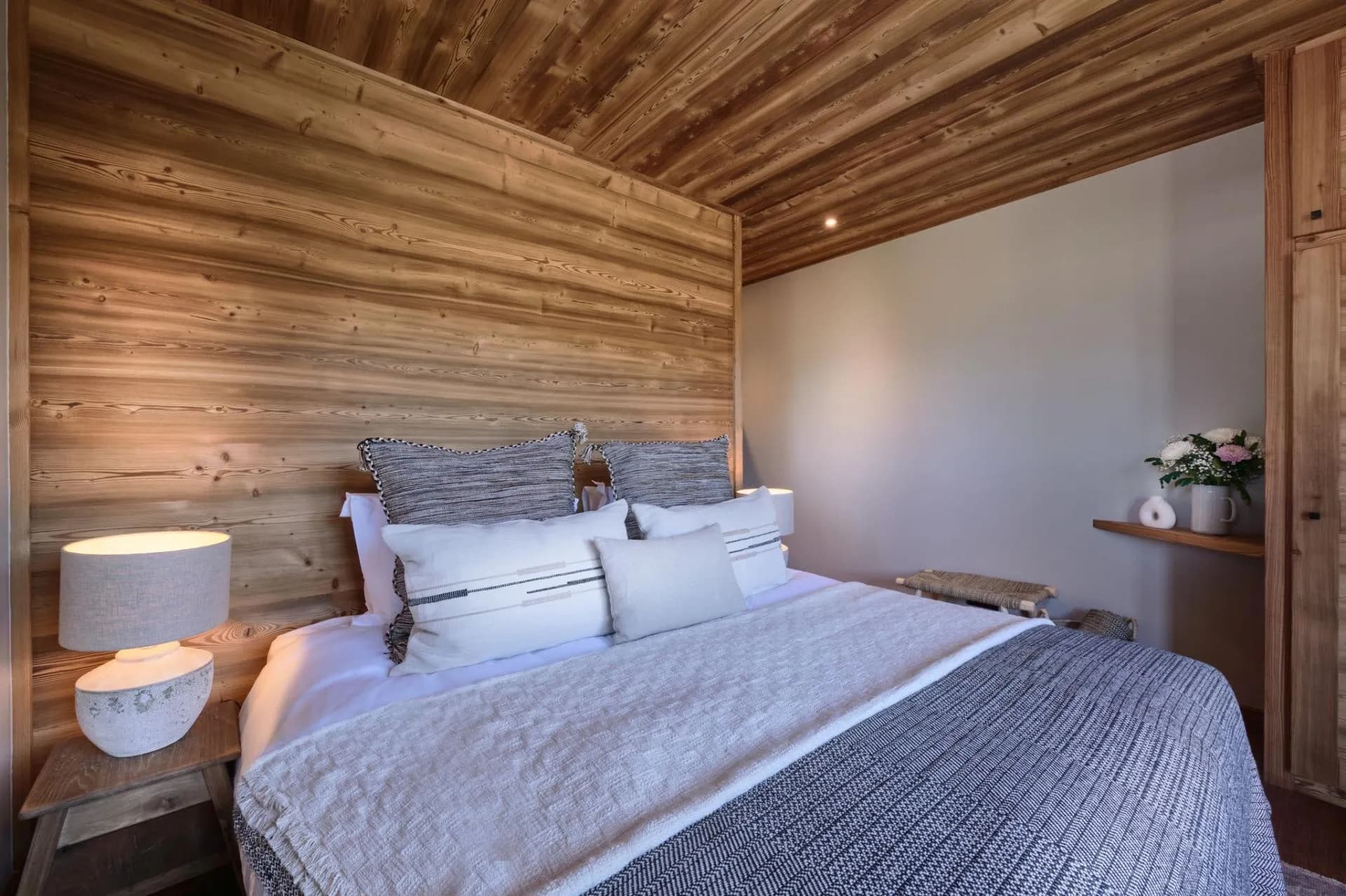 Wood-panelled bedroom with a super-king bed