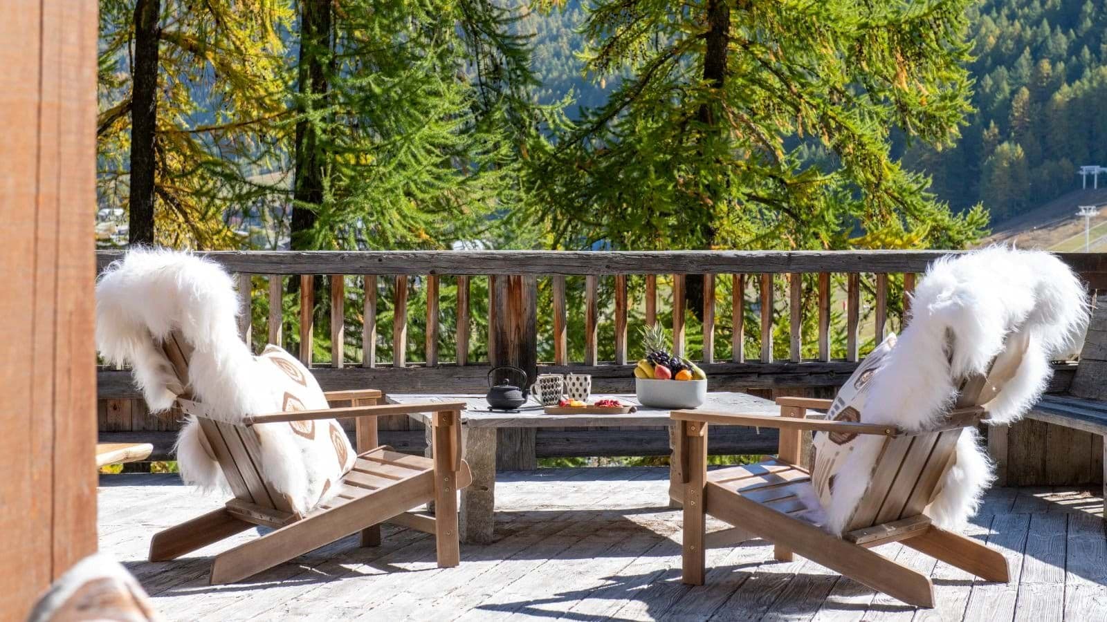 Private deck with Adirondack seating and views of the ski runs