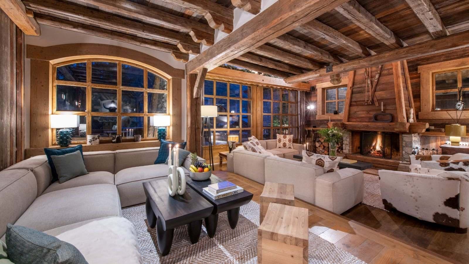 Living area with wood-burning fireplace and sectional seating for 10