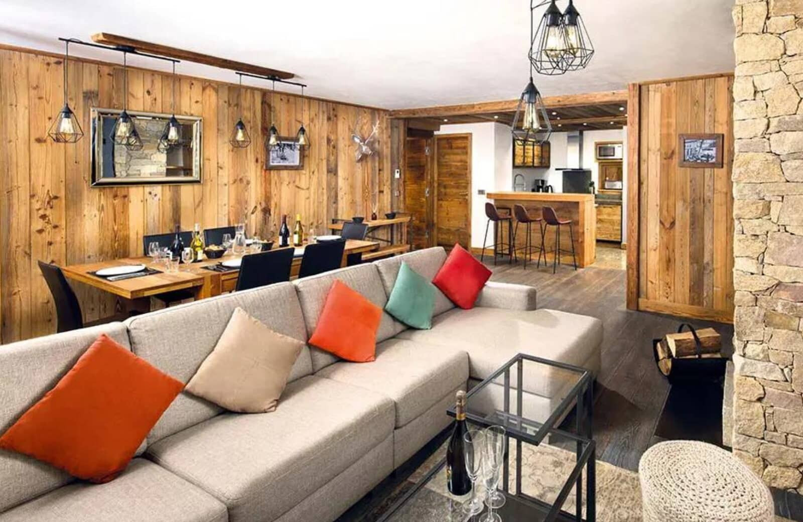 Open-plan living area with dining for 8 and kitchen breakfast bar