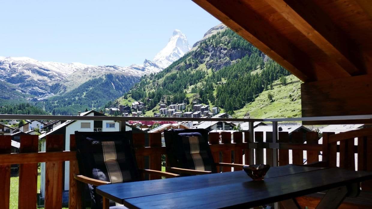 Covered balcony with Matterhorn views and outdoor dining for four