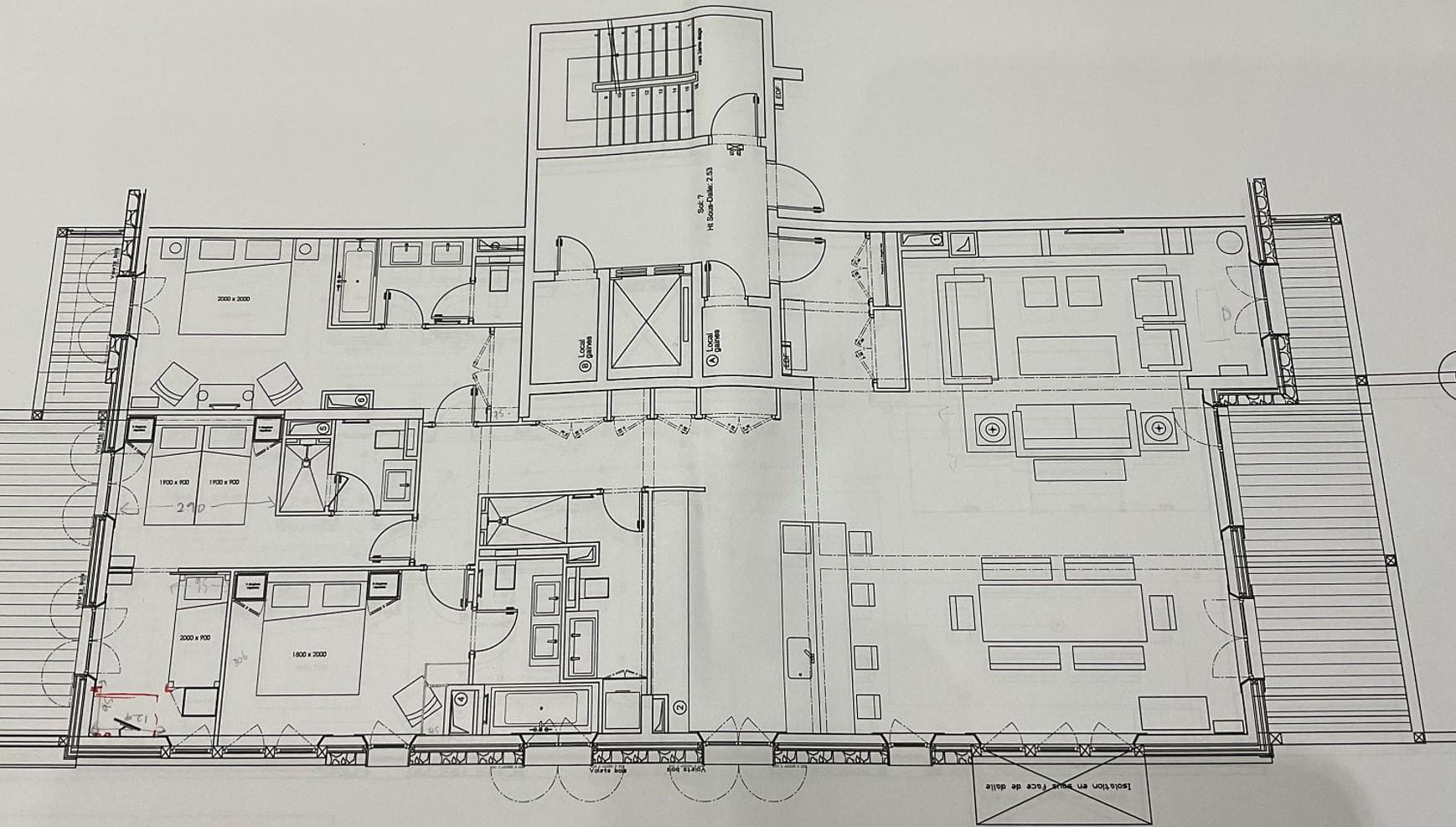 Floor plan: three en-suite bedrooms, open living area, and dual balconies