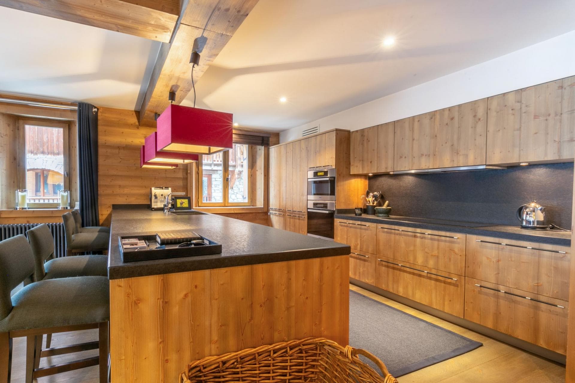 Kitchen with breakfast bar seating for 3 and integrated appliances