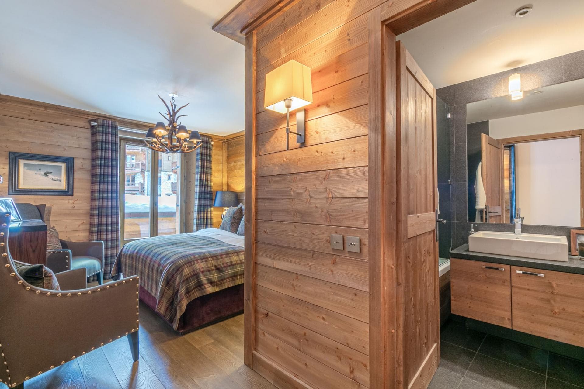 Bedroom with ensuite bathroom and private balcony access