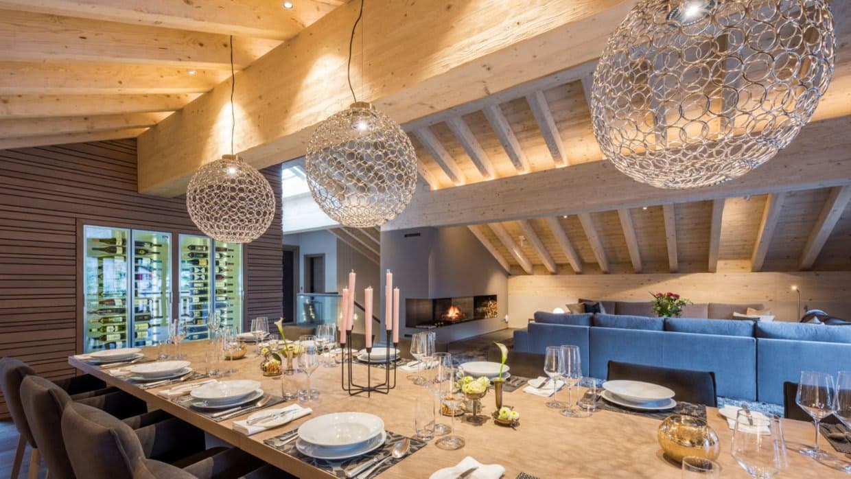 Dining area for 10 with climate-controlled wine storage and fireplace