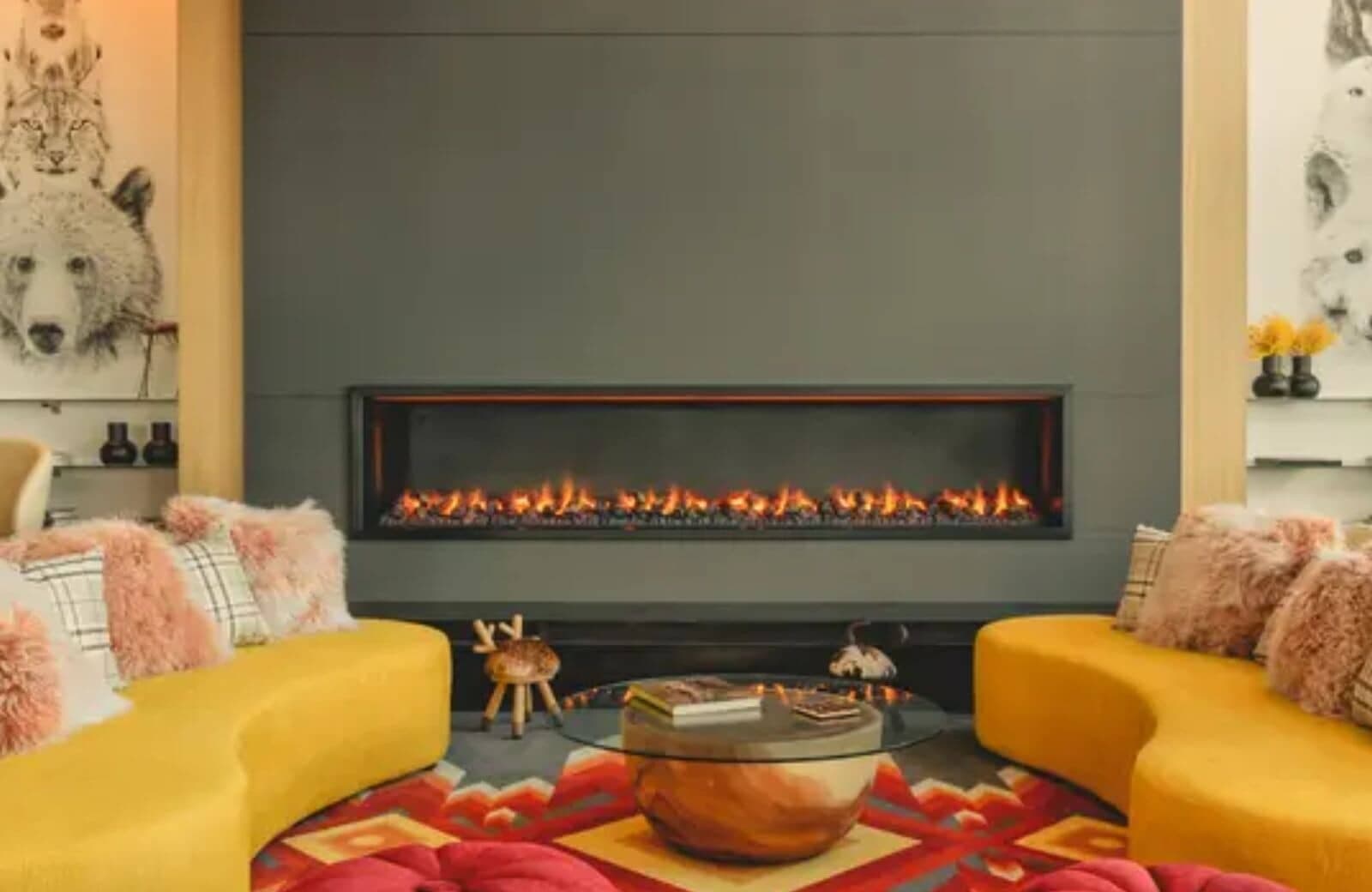 Living area with linear gas fireplace and curved lounge seating