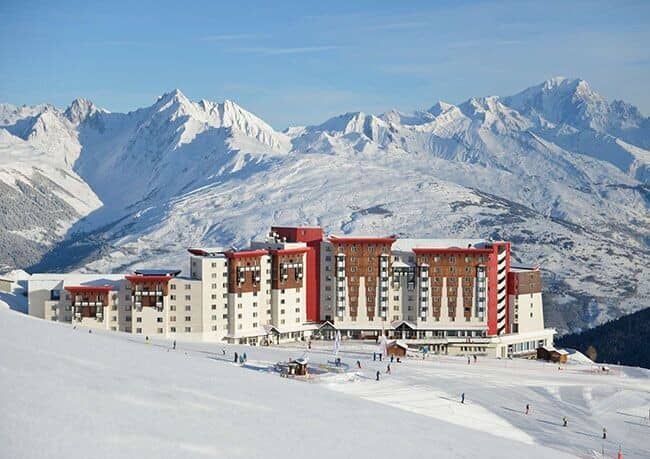 Ski-in/ski-out resort exterior with direct access to groomed runs