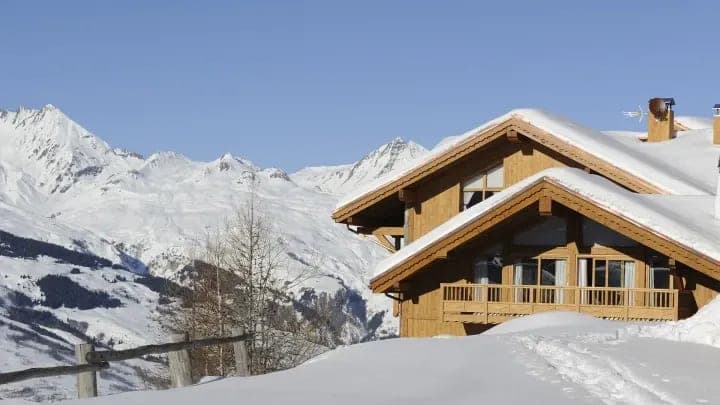 Ski-in/ski-out chalet with private balcony and panoramic Alpine views
