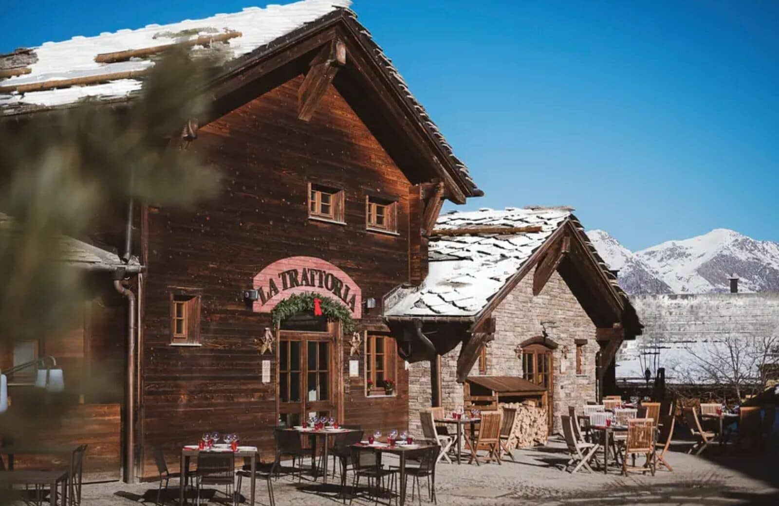 On-site restaurant with outdoor patio seating and mountain views