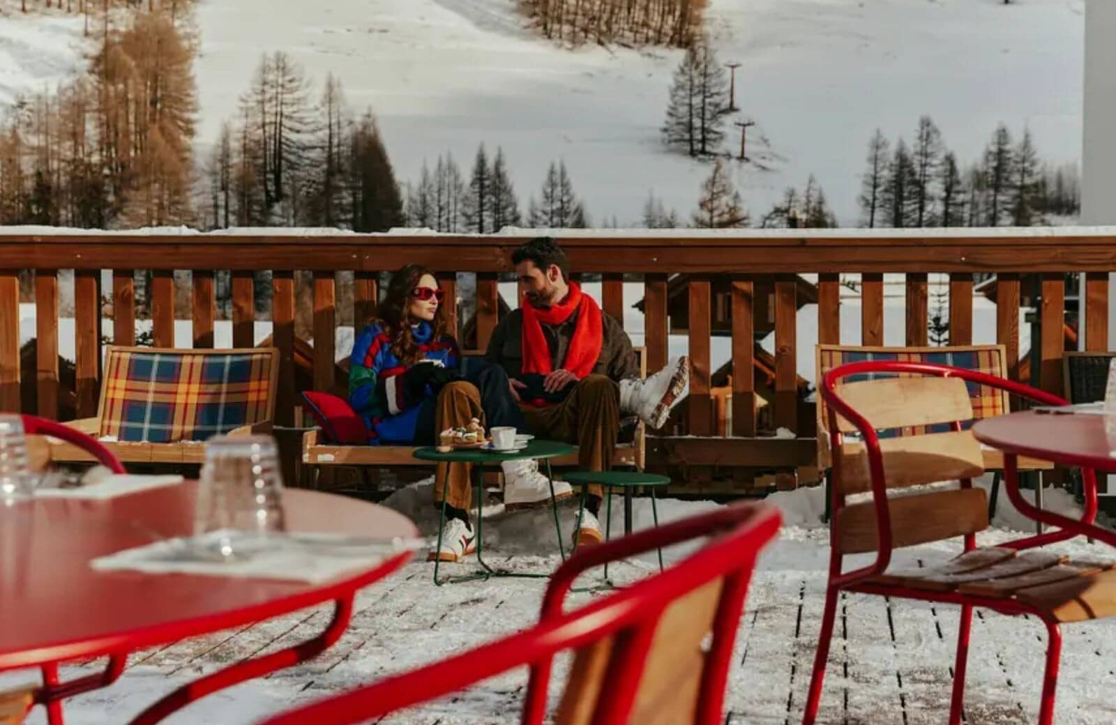 Ski-in, ski-out terrace with cafe seating and slope views
