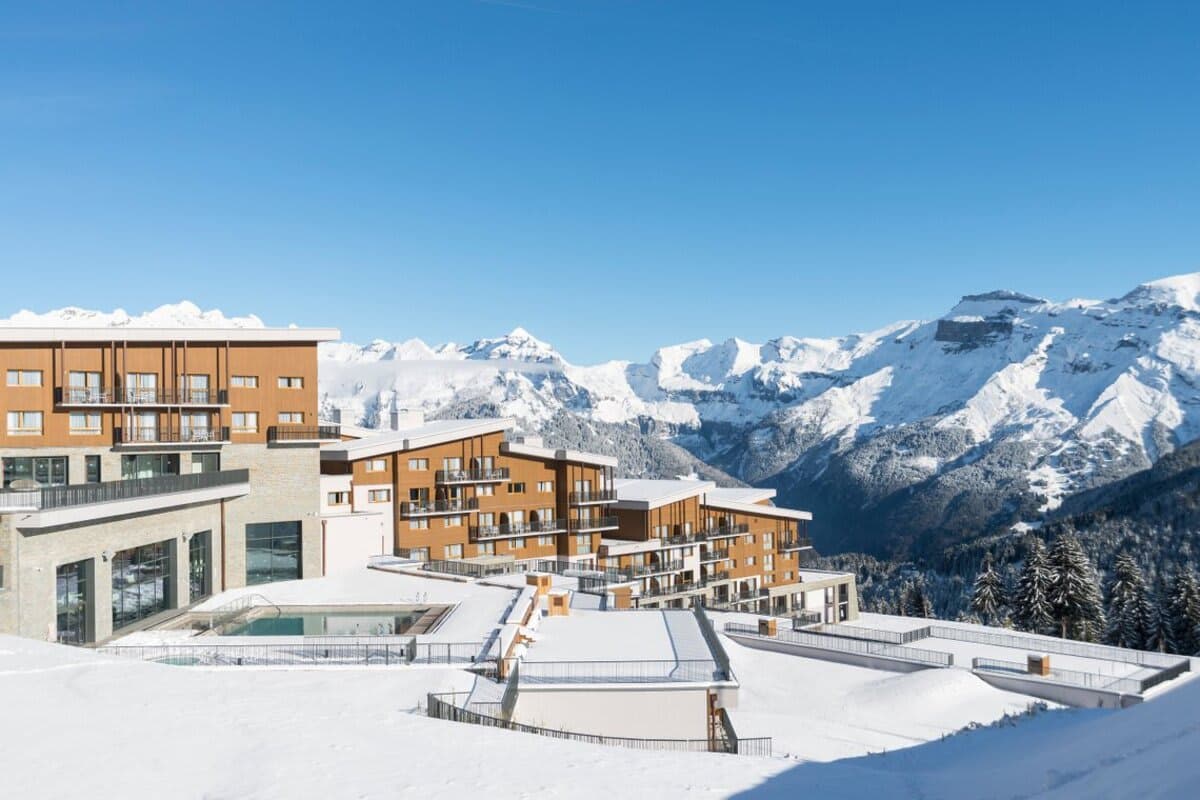 Ski-in/ski-out resort with heated outdoor pool and panoramic alpine views