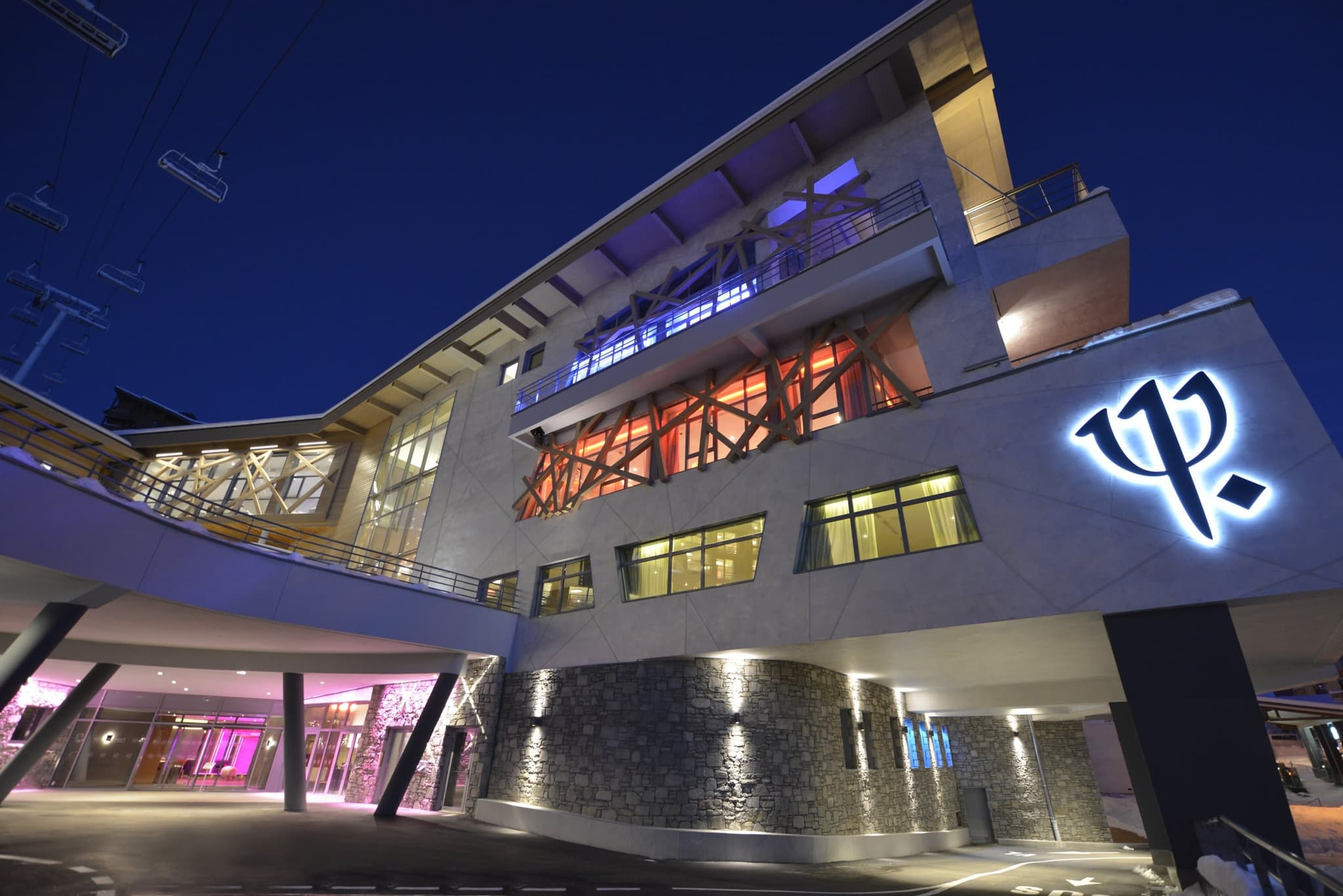 Ski-in/ski-out lodge exterior showing proximity to chairlift