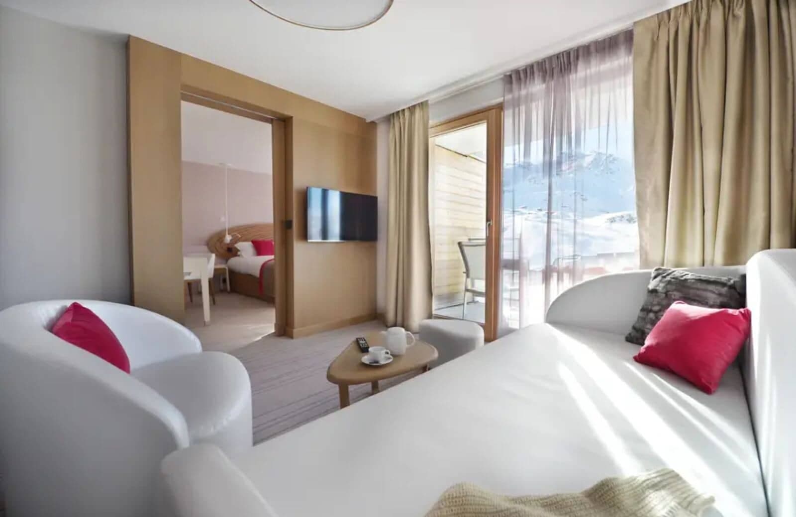 Guest suite with two queen beds and interconnecting door to secondary bedroom