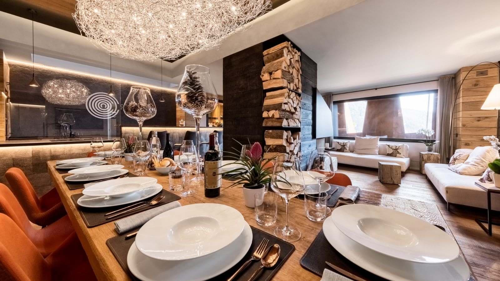 Open-plan dining area with seating for 8 and adjacent lounge