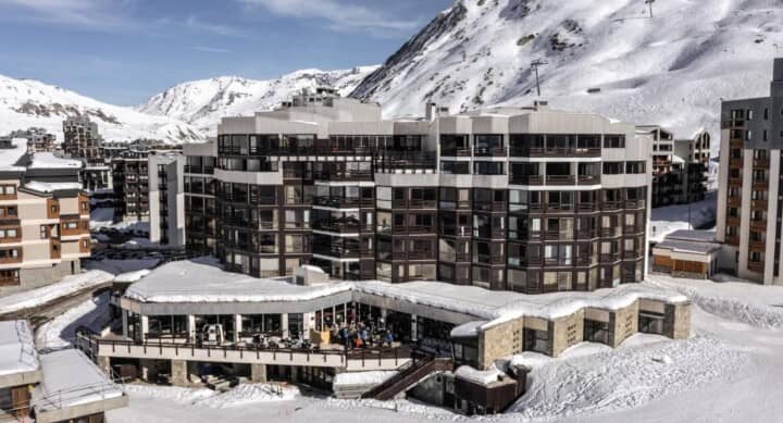 Ski-in/ski-out apartment building with private balconies and mountain views