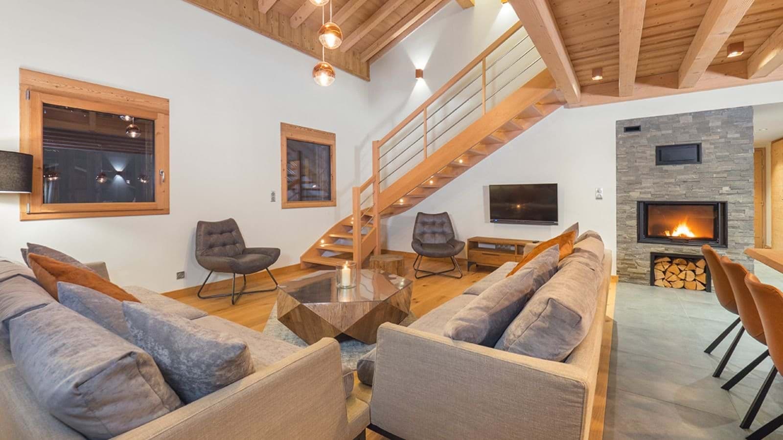 Living area with wood-burning fireplace and seating for 8