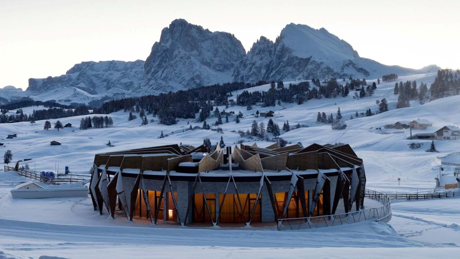 Ski-in, ski-out lodge with panoramic mountain views and wrap-around terrace