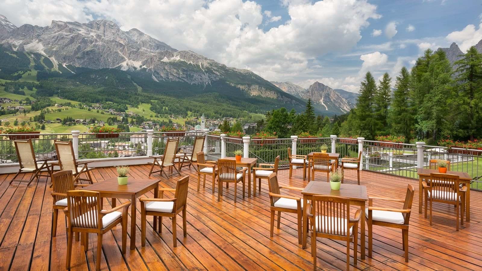 Wooden sun deck with seating for 20 and Dolomite mountain views