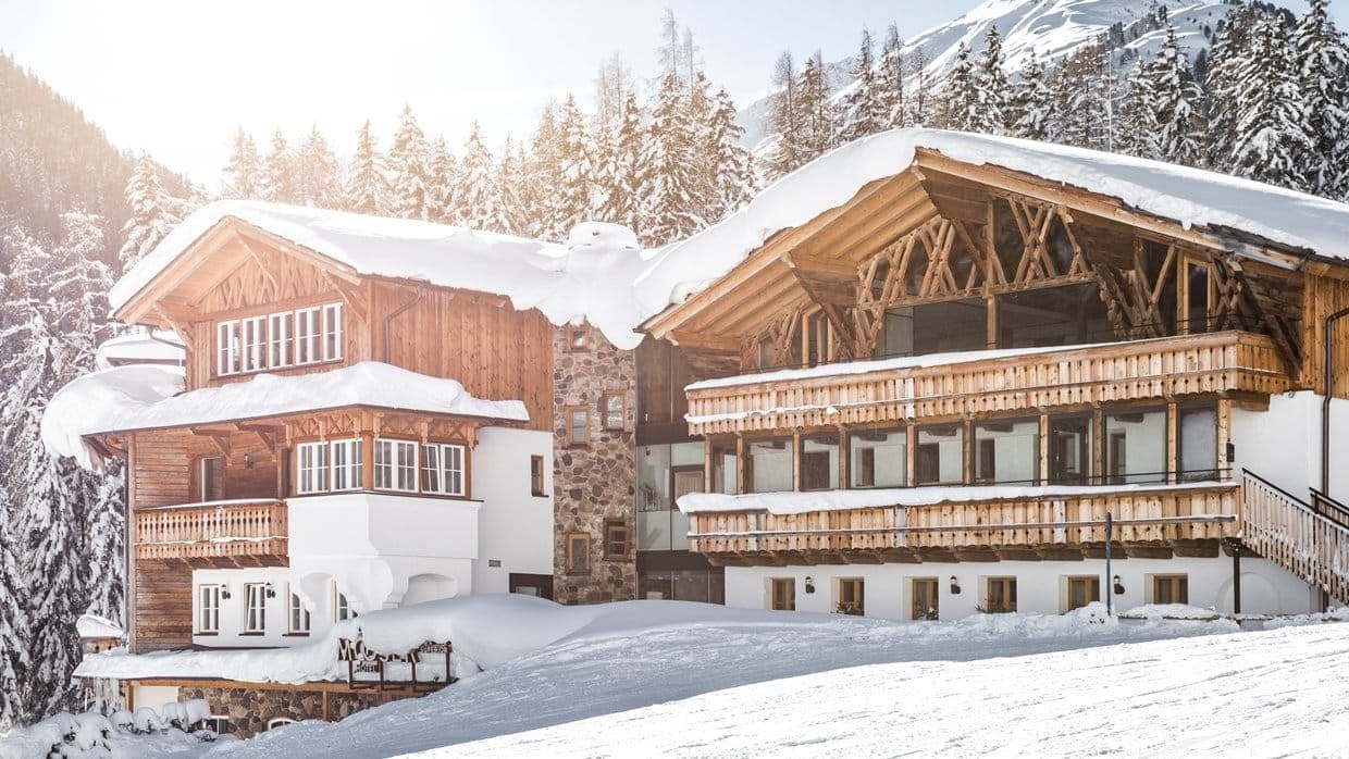 Ski-in/ski-out chalet with timber balconies and direct slope access