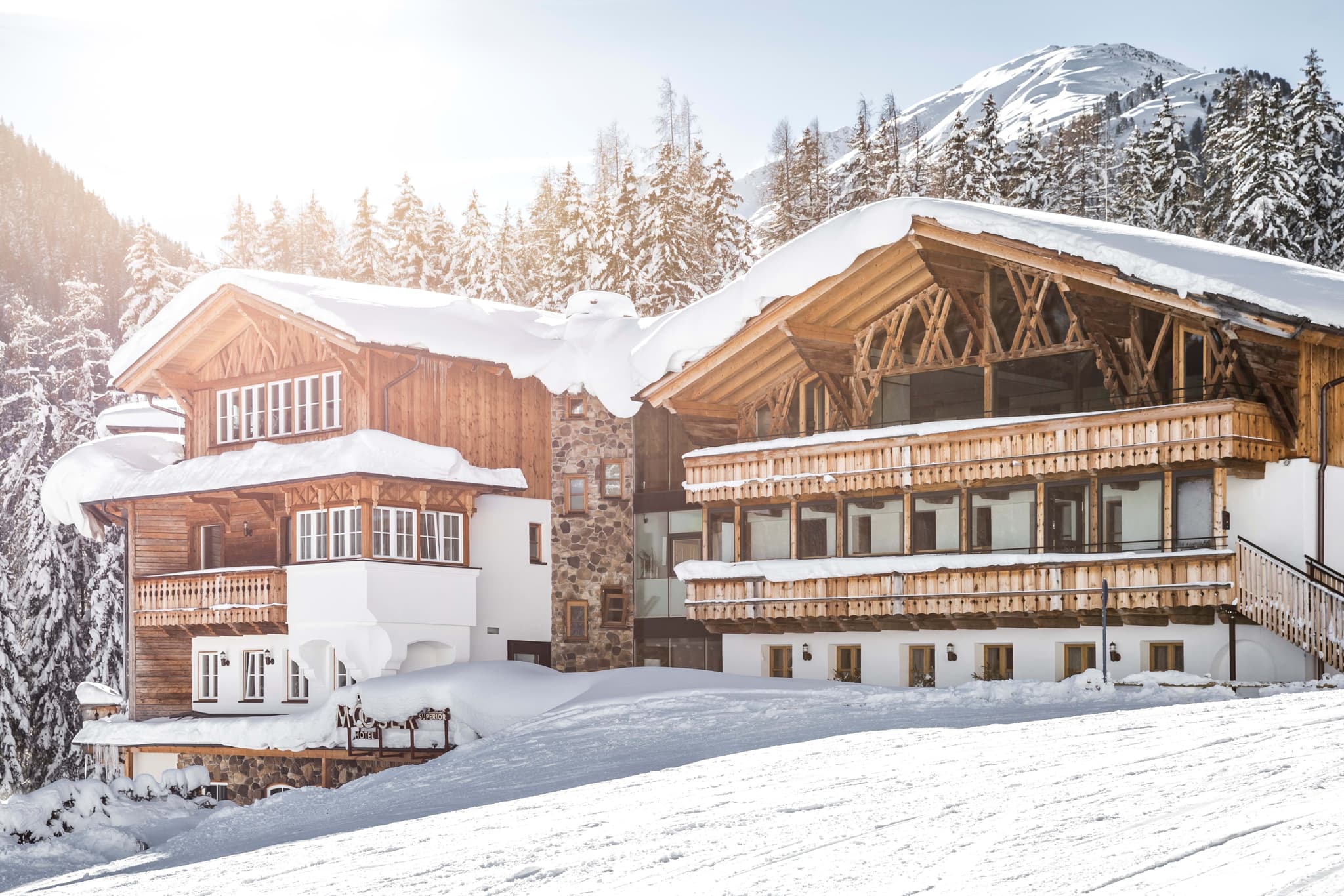 Ski-in/ski-out chalet with timber balconies and mountain views